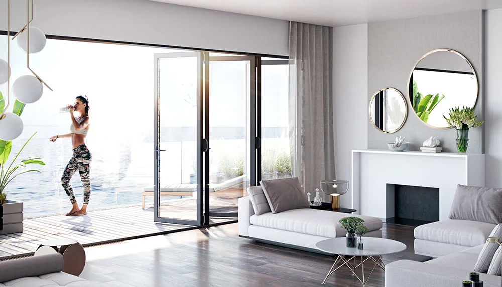 Aluminum folding patio doors opening a full wall to an outdoor deck